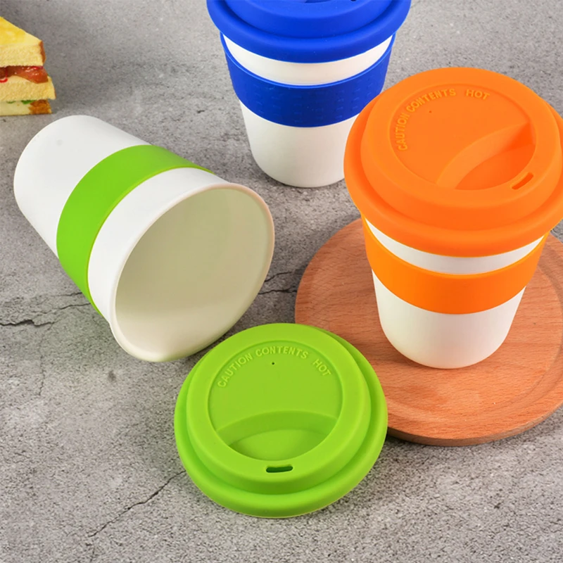 reusable coffee cup with silicone lid and sleeve