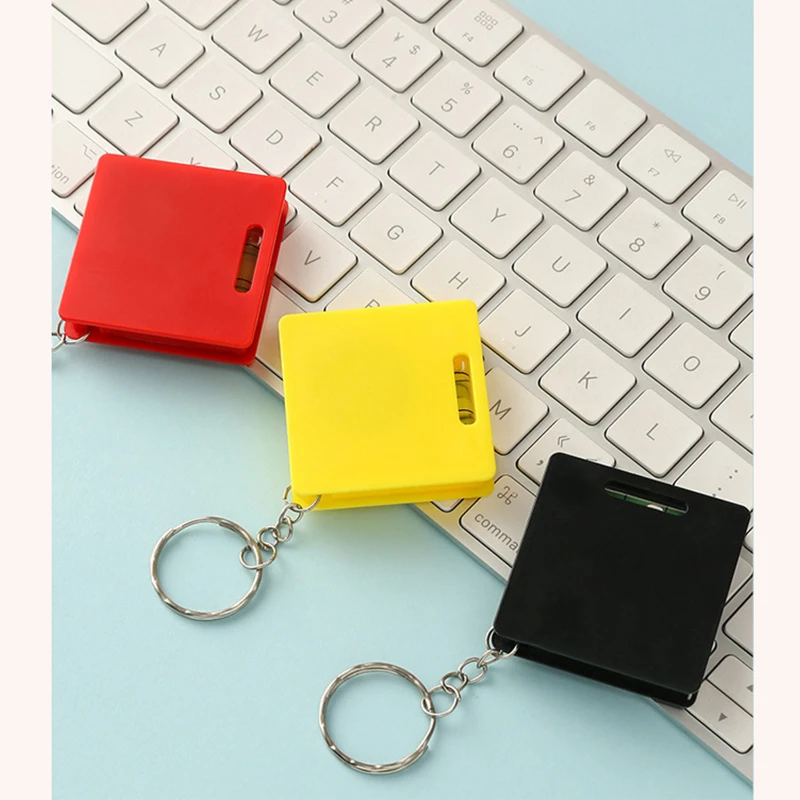 compact retractable tape measure with level