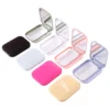 compact travel mirror with comb
