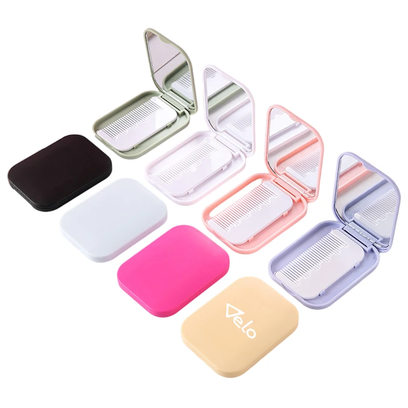 compact travel mirror with comb