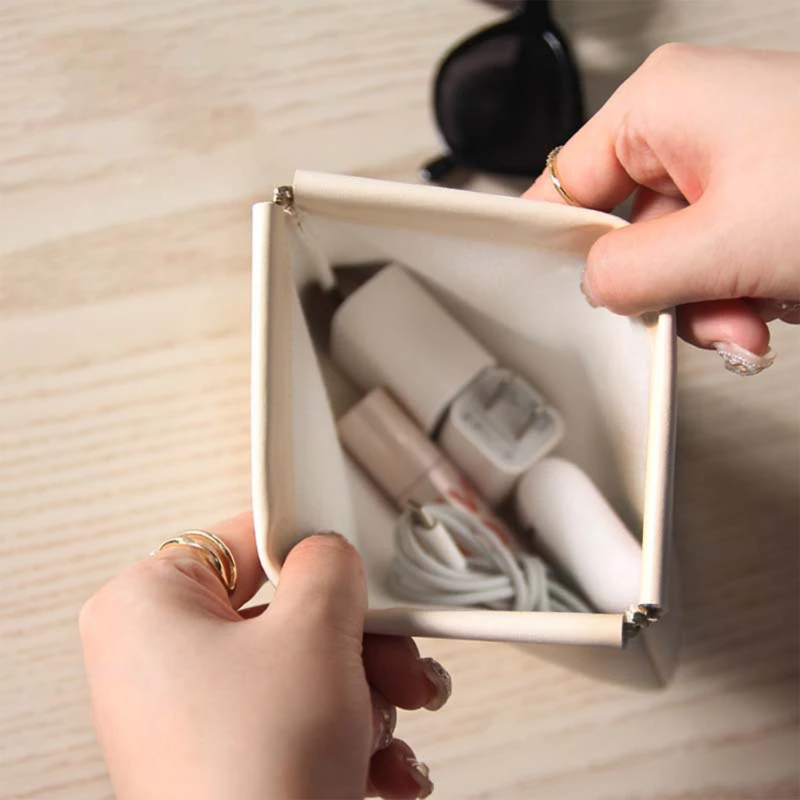 squeeze leather storage pouch