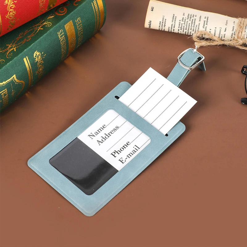 soft touch vegan leather luggage tag with creased edges