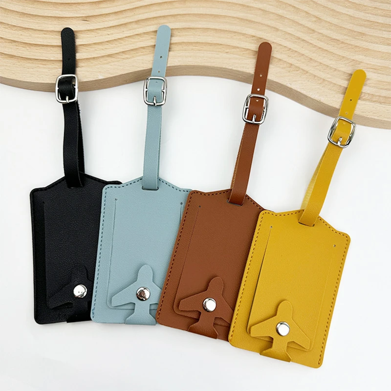 vegan leather luggage tag with snap button closure